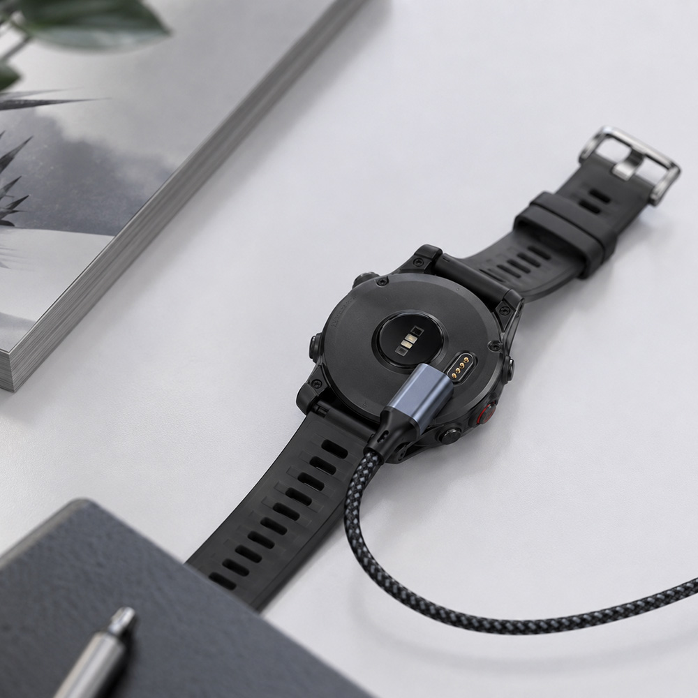Sports watch charging cable in daily charging environment