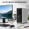 DisplayPort to HDMI cable connected from desktop PC to HDMI monitor in office setup