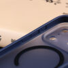 Close-up of matte case side edge, button cutout and smooth matte finish