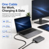USB-C cable in a modern desk setup for charging, data transfer, and video output with compatible devices