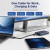 USB-C cable used in a modern desk setup for charging, data transfer, and video output