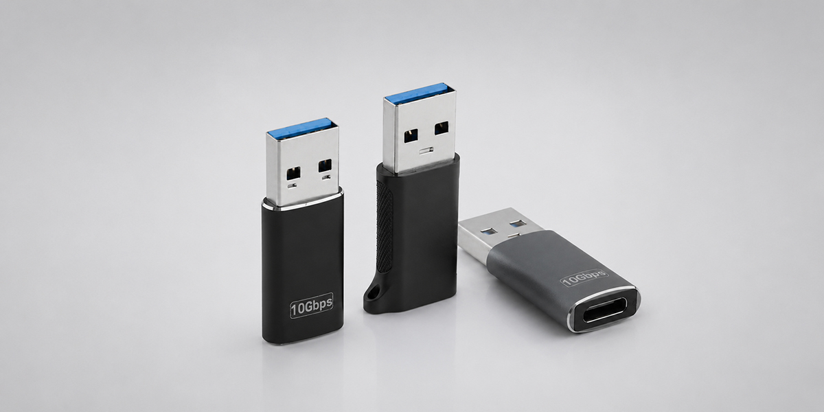 USB-A to USB-C adapters supporting 10Gbps data transfer in either USB-C plug orientation on a light gray background