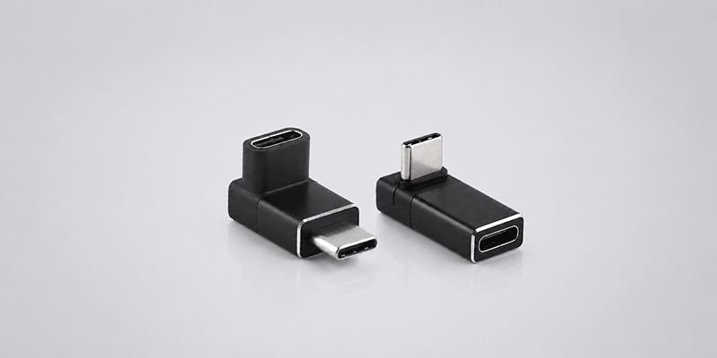 90-degree USB-C male-to-female right-angle adapter supporting 40Gbps data transfer on a light gray background