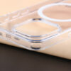 Close-up of the raised transparent camera frame on the UGOjP clear case for iPhone 14 and 15 Series