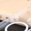 Close-up of the transparent corner protection on the UGOjP clear case for iPhone 14 and 15 Series.